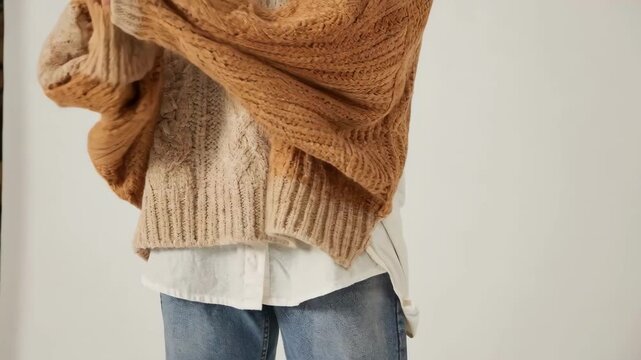Cozy oversized chunky pullover sweater featuring bold cable knit textures perfect for casual fall layering and making a relaxed fashion statement with plush heavyweight yarn.