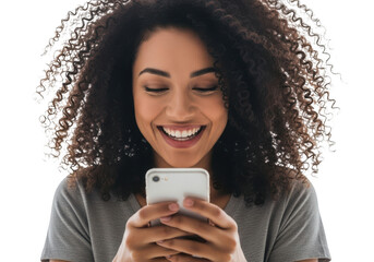Young woman smiling at smartphone isolated on transparent background