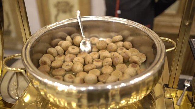Mini dal bati prepared in Marwari style in an Indian wedding