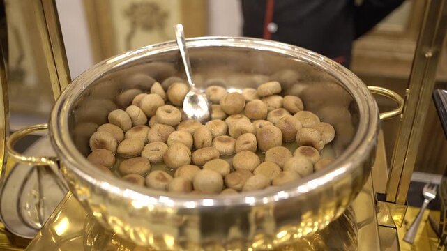 Mini dal bati prepared in Marwari style in an Indian wedding