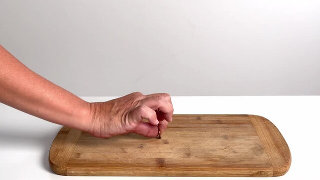 Video with real sound effect of Coin scraping on wood