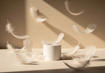 Soft white feathers floating gently around a cylindrical object on a table with warm lighting and beige background