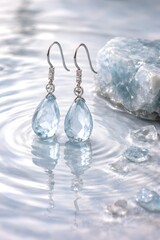 Elegant Blue Gemstone Earrings Displayed on Calm Water Surface with Crystalline Stone and Soft Reflection for Jewelry and Fashion Photography