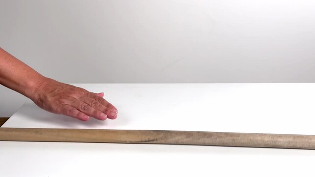Video with real sound effect of  Wooden stick rolling