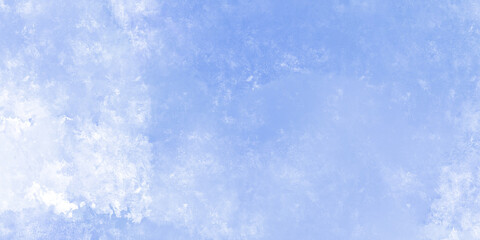 Obraz premium Serene blue sky with fluffy white clouds, evoking a sense of tranquility and freedom