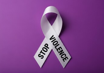 White stop violence awareness ribbon on purple background