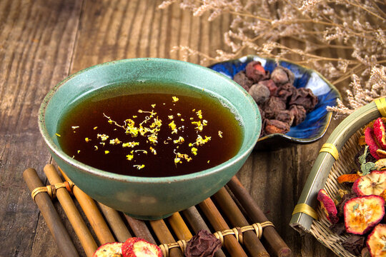 Iced Sour Plum Drink on Dark Background