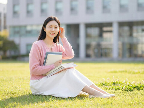 캠퍼스에서 책을 든 여학생 / Female Student Holding Books on Campus