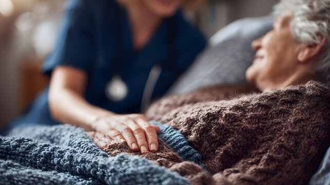 Compassionate Healthcare Worker Holding Senior Patient Hand During Comforting Terminal Care Visit 