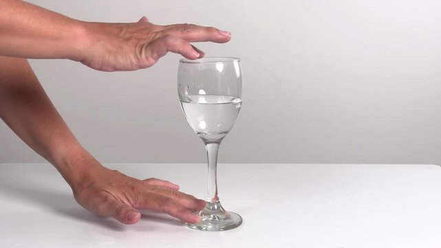 Video with real sound effect of Wine glass rim rub singing glass tone