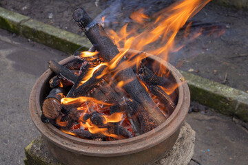 Burning Firewood in Clay Pot - Outdoor Rustic Fire Scene