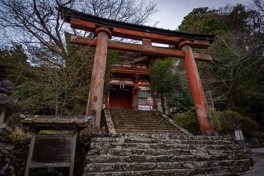 Old Decaying Torii Gate in Japanese Countryside, Abandoned to Time 