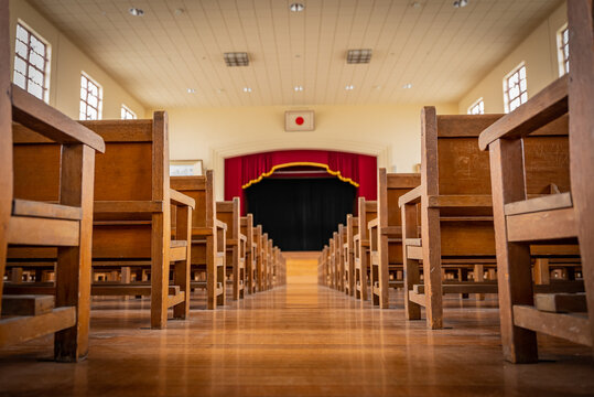 Japanese Old Fashioned Wooden School Auditorium with Flag