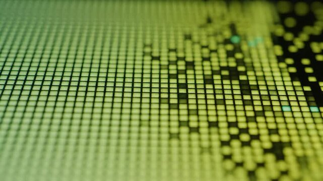 Abstract grid pixelated pattern in green and yellow gradient background