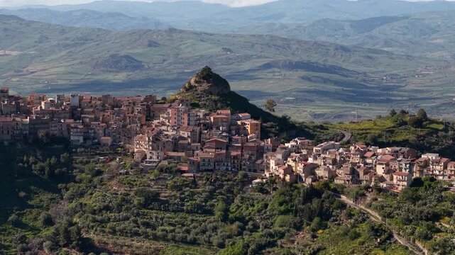 Stunning Castello di Corradino Centuripe Sicilian hill town aerial view overlooking lush valley