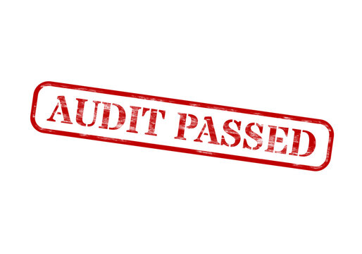 Red and white audit passed rubber stamp on black background