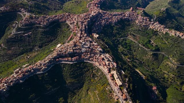 Aerial birds eye view over Centuripe mountain town commune in the Enna province of Sicily, Italy