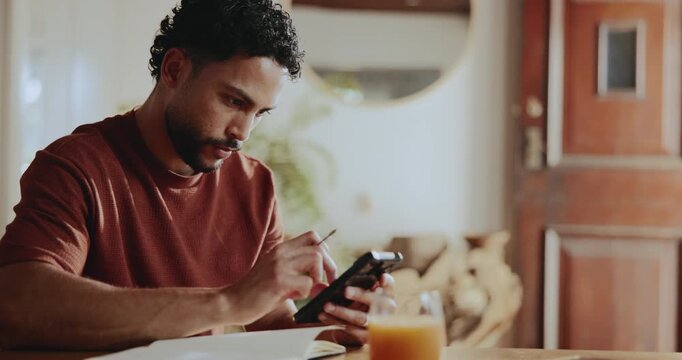 Creative, man and phone with notebook in home for research, calendar and story structure. Male person, remote work and mobile for interview date, writing questions and reminder of article publication