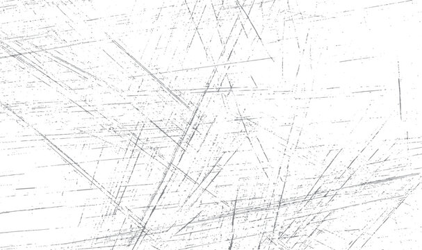 Abstract grey scratches and speckles on a white background texture grunge