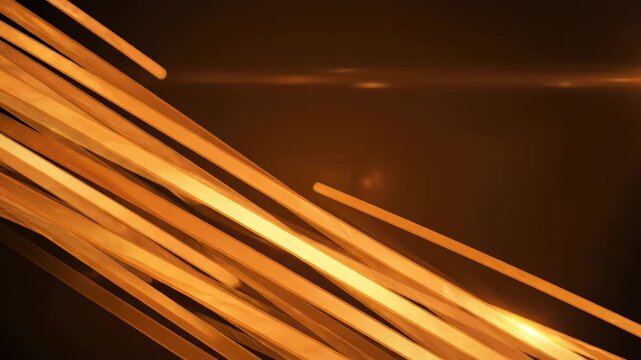 Gleaming orange bands with subtle light flares create a dynamic, abstract background