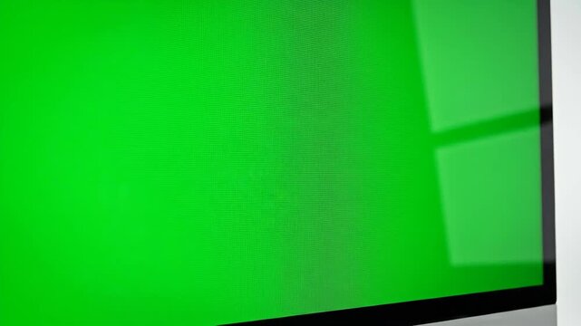 Computer monitor display with chroma key green screen for content insertion
