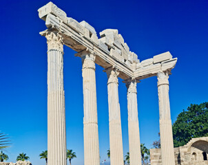 Fototapeta premium The ancient Temple of Apollo ruins against blue sky in Side, Turkey