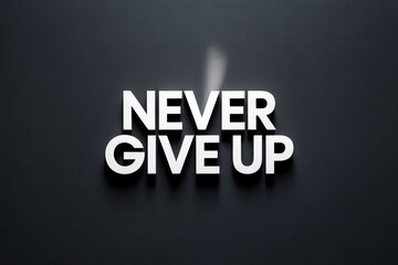 Fototapeta premium A motivational phrase 'Never Give Up' displayed prominently on a dark background