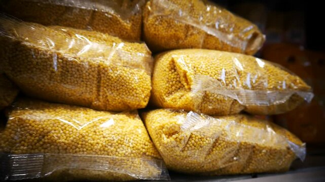 Close-up of millet packages in a food storage facility