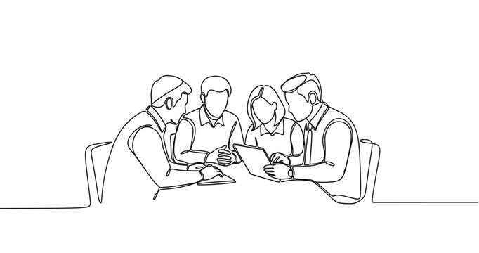 Diverse group of adults collaborating over tablets and documents at table. No editable stroke