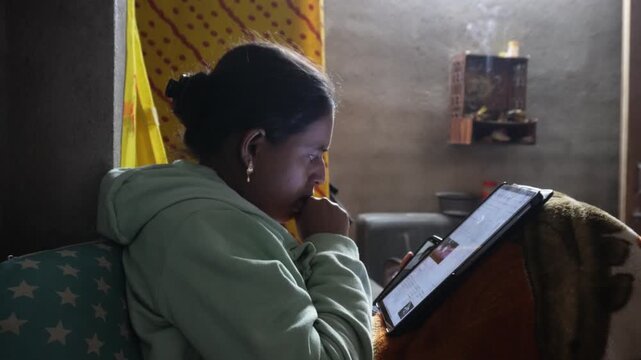 Rural Indian Woman Accessing Education on Digital Tablet