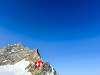 Swiss Flag Over Jungfrau