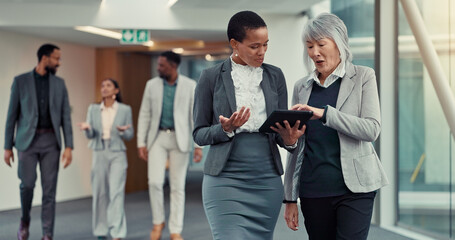 Office, hallway and women with tablet, talking and criminal attorney with info for case or...