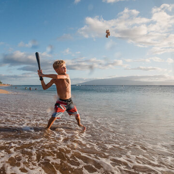 playing baseball in the ocean in hawaii