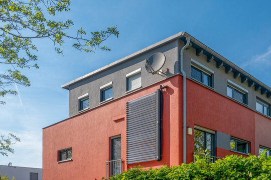 Modern house with solar thermal hybrid collectors for water heating in Augsburg