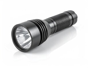 Cylindrical black flashlight, angled, on white surface