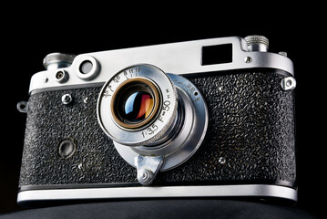 Retro rangefinder camera isolated on black