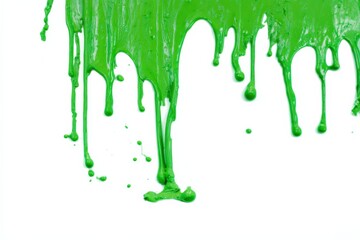 Vibrant green paint drips on white background creating fluid abstract art