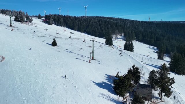 Aerial View of Ski Resort Slopes With Skiers and Snowboarders, Winter Mountain Landscape