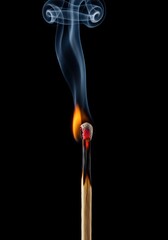 Half burned matchstick isolated on dark background burnout energy concept