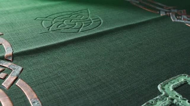 Close-up of a green background with Celtic knot design, suitable for St. Patrick s Day themed projects and copy space for festive messaging
