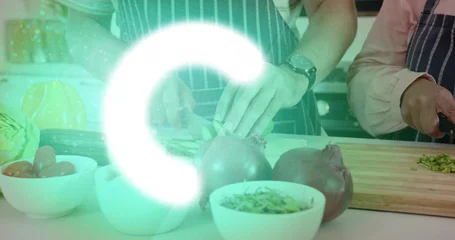 Fotobehang Koken Slicing vegetables, chopping herbs, couple in striped aprons preparing meal at counter, with knives  © vectorfusionart