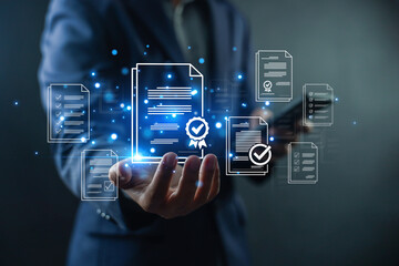 Fototapeta premium Businessman presenting approved digital documents with certification badge and check mark, document verification and compliance management concept, quality assurance, audit and validation process.