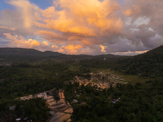Aerial View of Sunset Clouds Reflected in Rice Fields, Sidemen, Bali, Indonesia