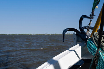 Anchor on board a fishing boat overlooking the sea