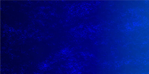 Obraz premium An abstract blue grunge background features a dark winter sky pattern with light snow stars and purple motion art for a decorative xmas wallpaper design