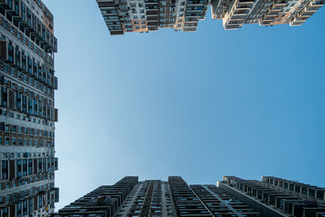 Looking Up at Dense High Rise Apartment Buildings © syu
