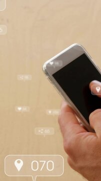 Vertical video: Right hand tapping phone, tech UI pin icon updating numbers tracking geotags