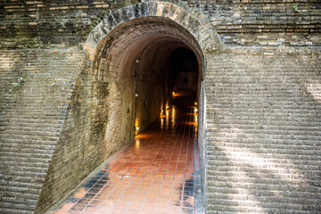 Separate fragments of a decorated Buddhist temple in Thailand on a sunny day