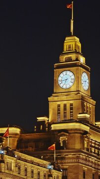 Shanghai, China. Clock tower of Shanghai, soaring beautifully at night. The Bund, Shanghai Custom House Building, The Clock Tower
