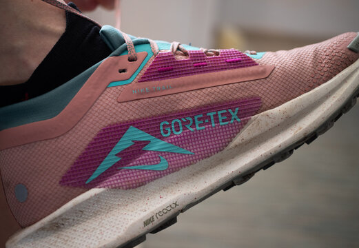 woman wearing nike trail running shoes